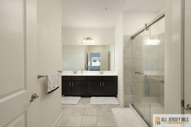 421 Tavern Road Monroe Township, NJ 08831 - Photo 18 of 27 a bathroom with a bathtub and a shower