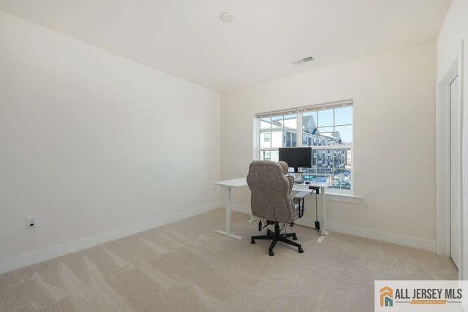 421 Tavern Road Monroe Township, NJ 08831 - Photo 21 of 27 a view of a workspace with furniture and a window