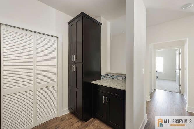 421 Tavern Road Monroe Township, NJ 08831 - Photo 7 of 27 a en suite bathroom with a sink and a mirror