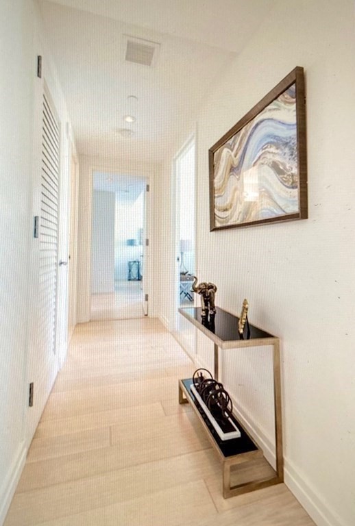 1 Franklin Street, Unit 1205 Boston, MA 02110 - Photo 7 of 16 workspace with furniture and wooden floor