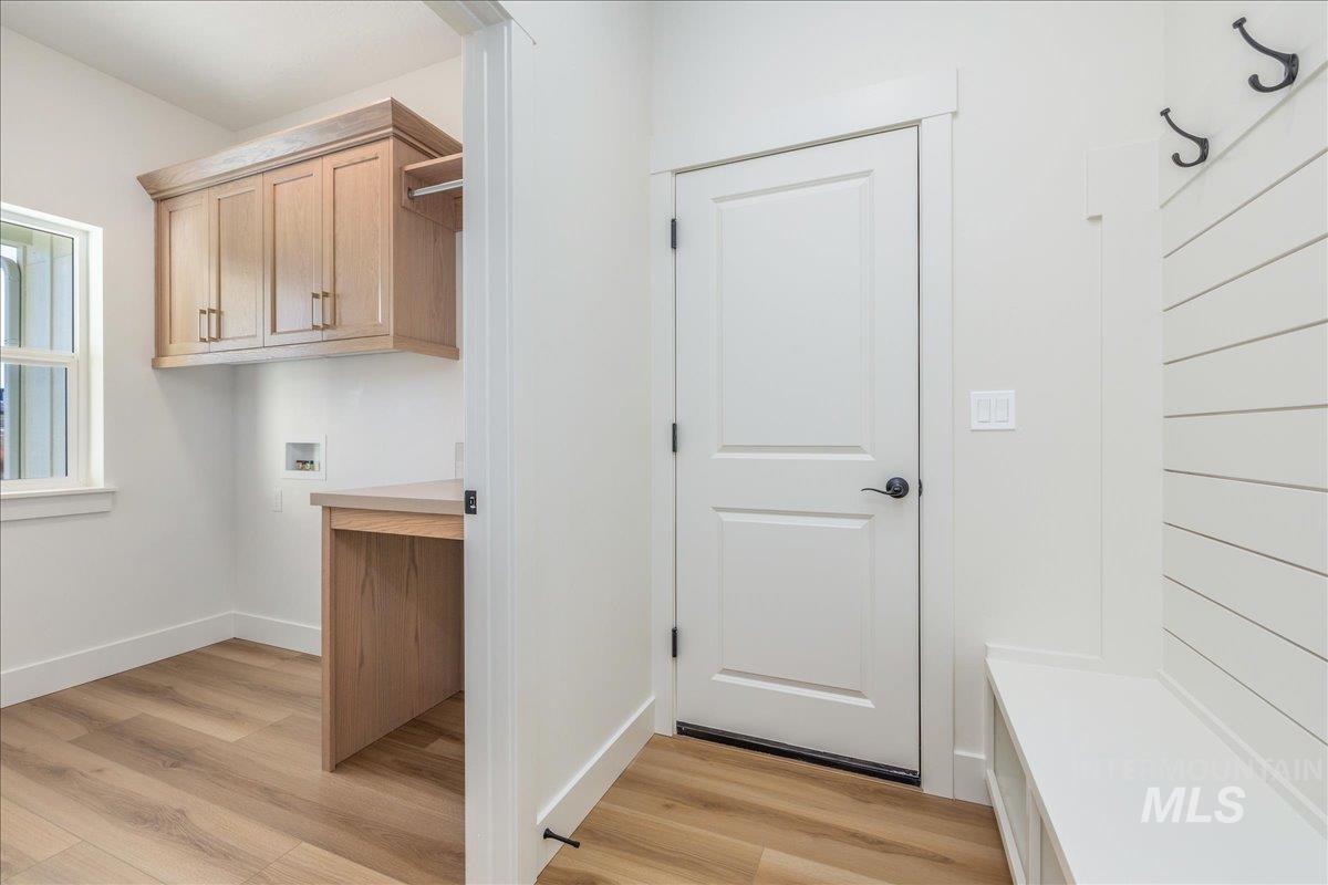 775 Pinehurst Street Payette, ID 83661 - Photo 24 of 36 Mudroom with light wood-style floors