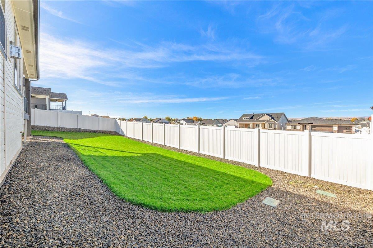 775 Pinehurst Street Payette, ID 83661 - Photo 34 of 36 Fenced backyard with a residential view