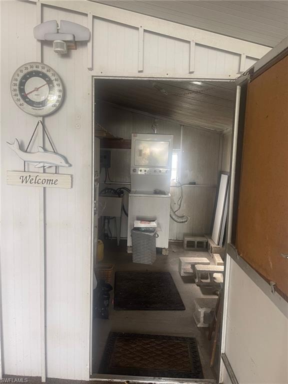 85 Enchanting Boulevard, Unit E85 Naples, FL 34112 - Photo 11 of 15 a bathroom with a sink and a mirror