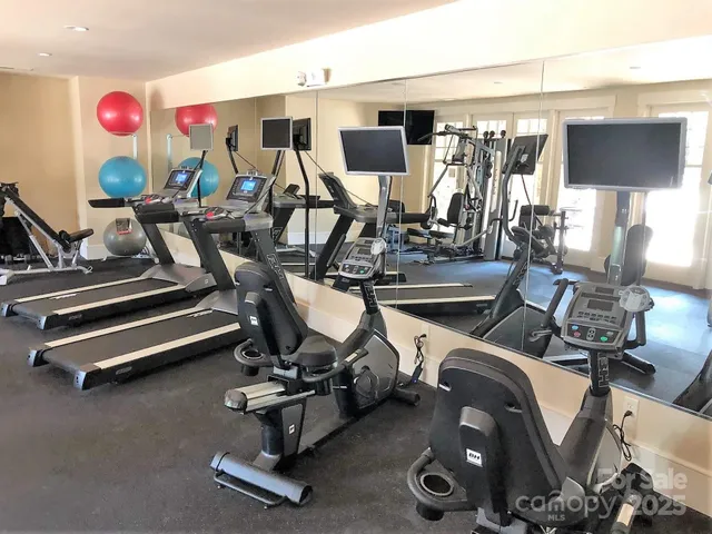 a view of a room with gym equipment