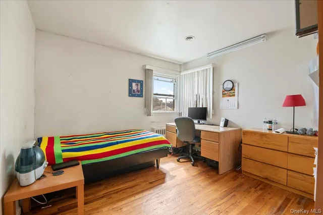 a room with a bed and a desk