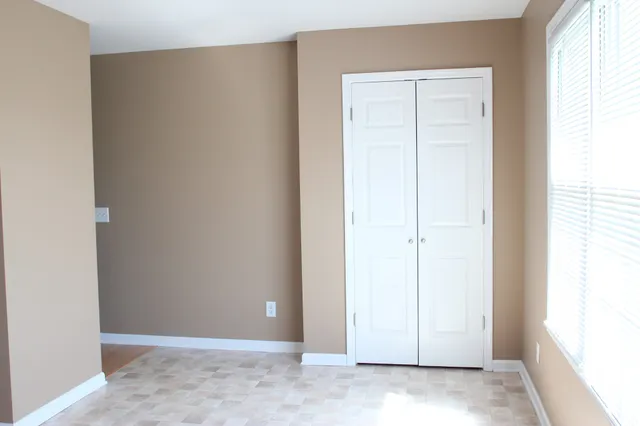a view of a sink and a window