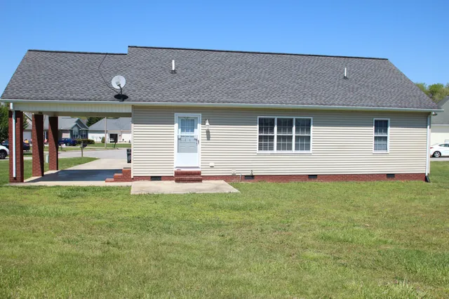 a house view with a garden space