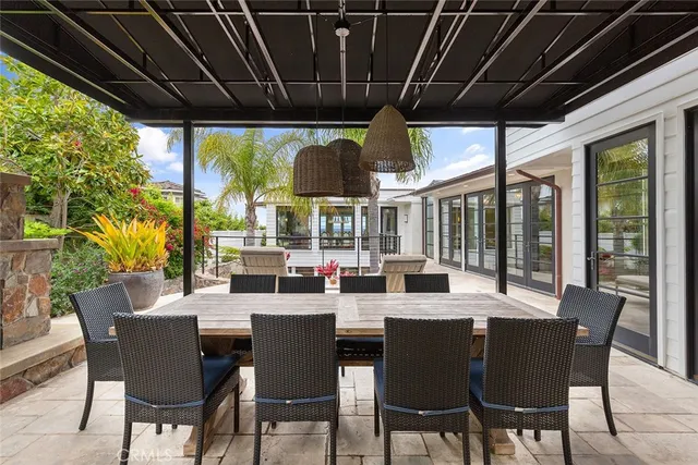 a view of a chairs and tables in the patio