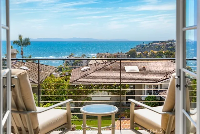a bedroom with a bed couch and window