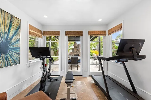 a utility room with sink dryer and washer