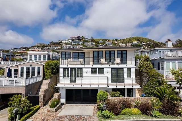 a view of a dining room kitchen and windows
