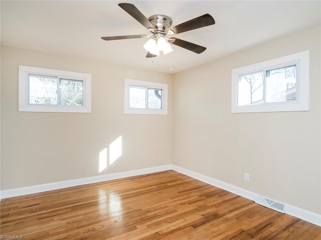 209 Edgeview Road High Point, NC 27260 - Photo 12 of 20 Spacious third bedroom with hard wood floors throughout. Ceiling fan, large closet, easy access to hall bath.