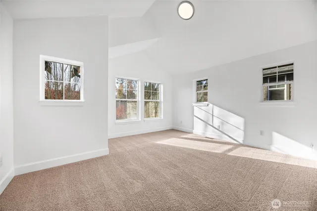 a view of empty room with windows