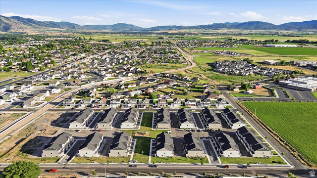 2257 South 1090 West, Unit 74 Nibley, UT 84321 - Photo 36 of 40 Aerial perspective showcasing a developing residential community