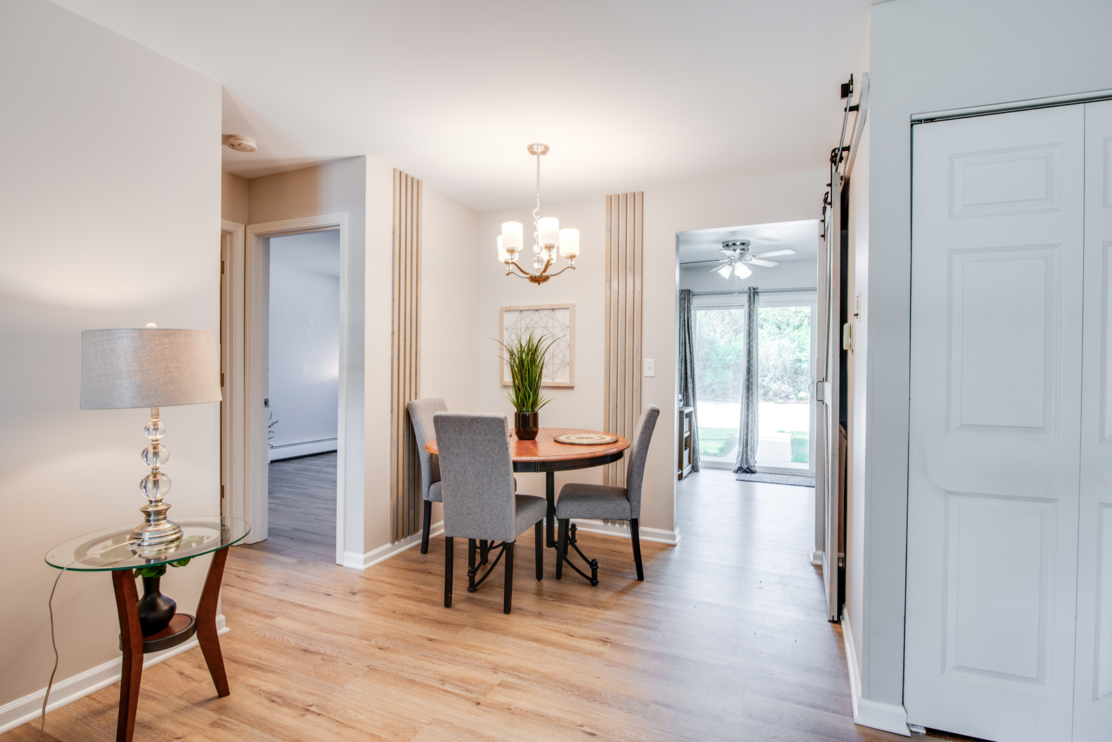 420 Echo Lane, Unit 101 Aurora, IL 60504 - Photo 8 of 16 a view of a dining room with furniture and wooden floor