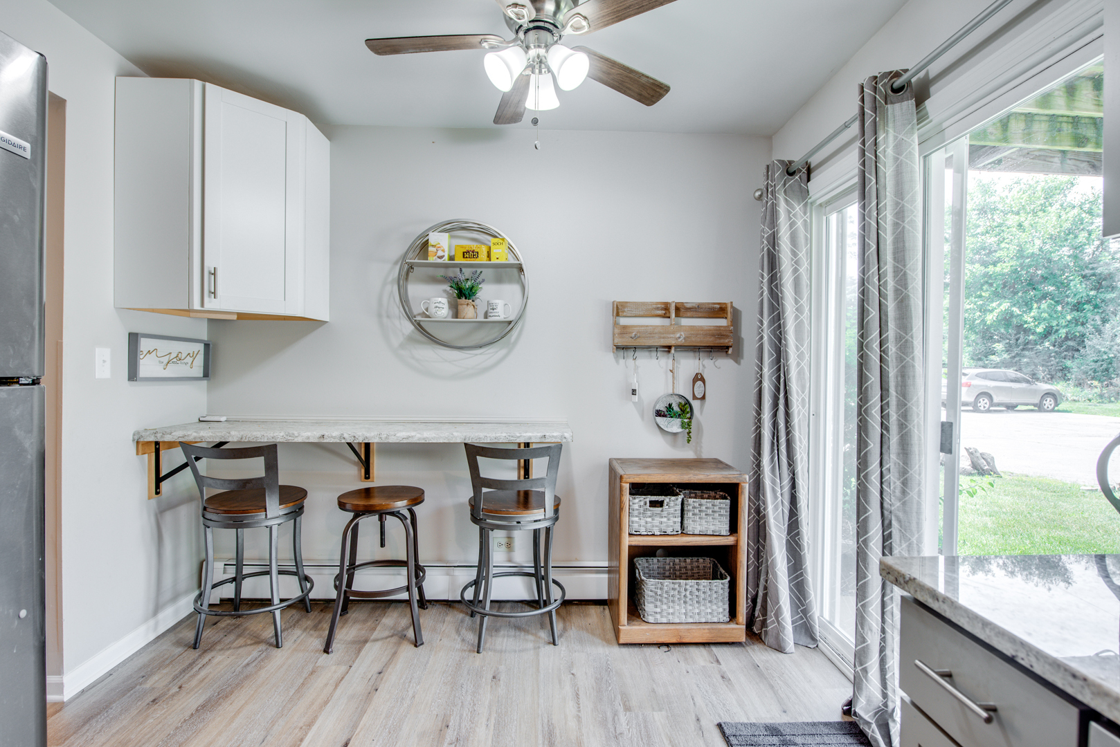 420 Echo Lane, Unit 101 Aurora, IL 60504 - Photo 10 of 16 a view of a dining room with furniture window and wooden floor