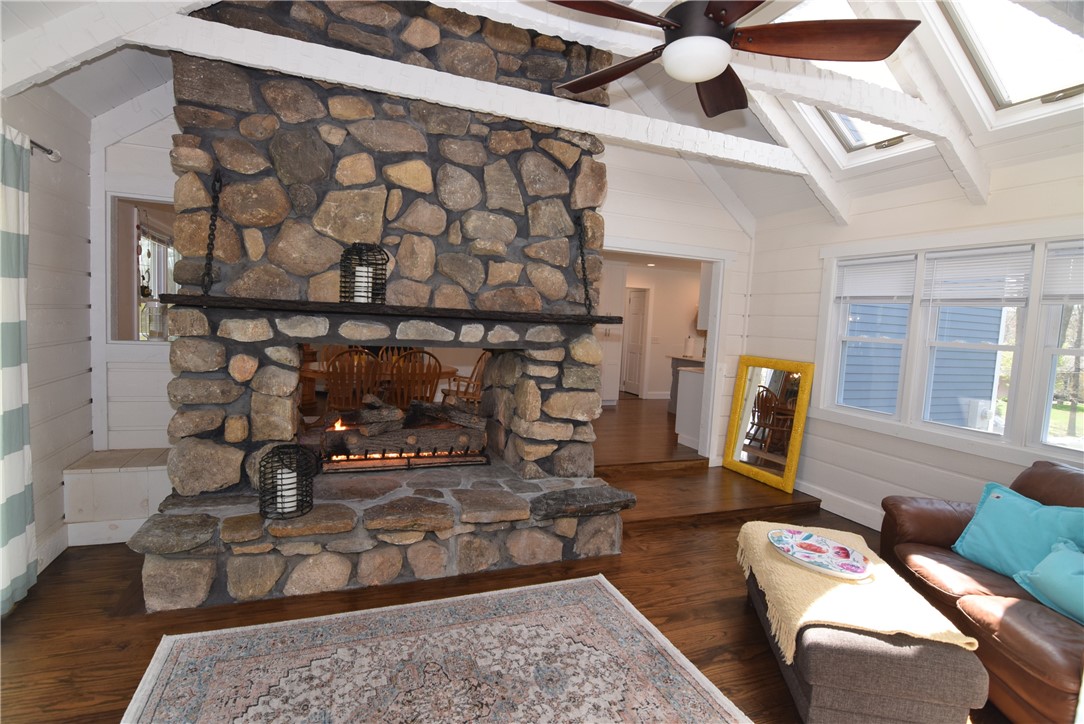 8 Lima Drive Westerly, RI 02891 - Photo 6 of 42 Two way stone fireplace just off kitchen, dining room and playroom