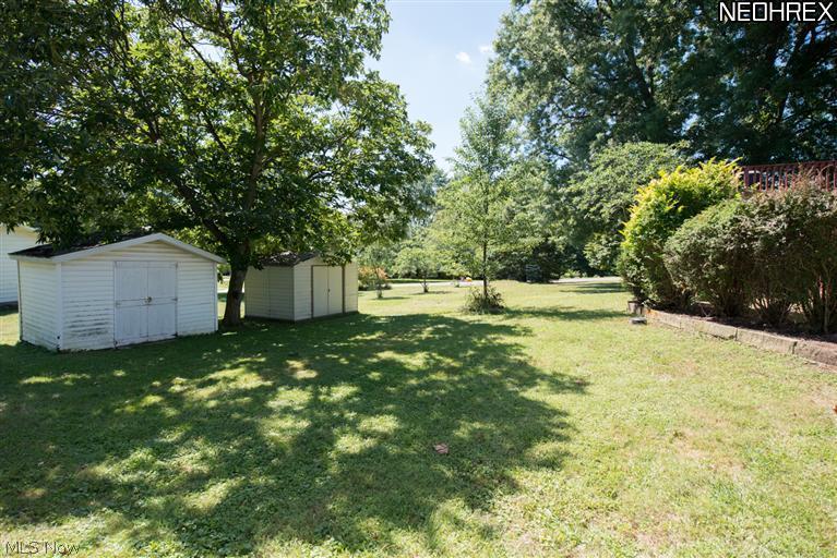 544 East Caston Road Uniontown, OH 44685 - Photo 16 of 18 Backyard with view of shed (on the right)