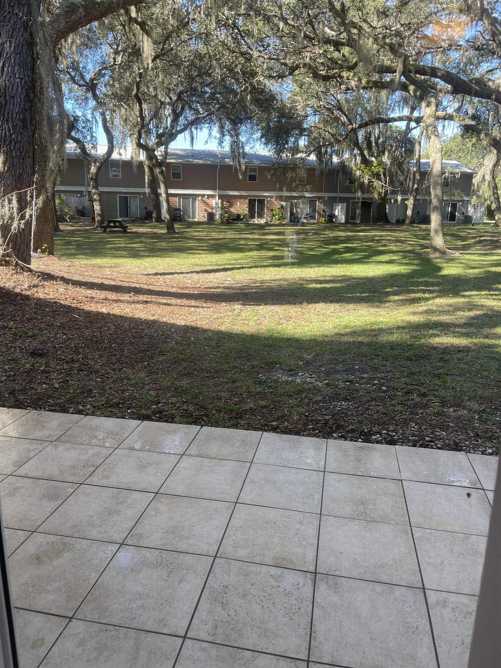 4420 Carter Road, Unit 58 St. Augustine, FL 32086 - Photo 13 of 13 a front view of a house with a yard