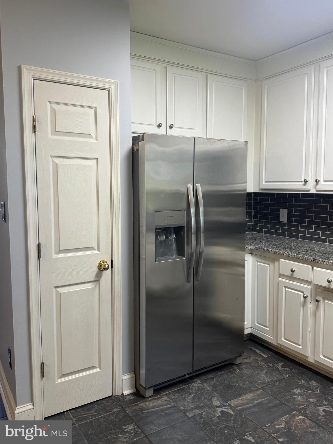 3850 Koval Lane Woodbridge, VA 22192 - Photo 10 of 61 a kitchen with stainless steel appliances granite countertop a refrigerator and a stove