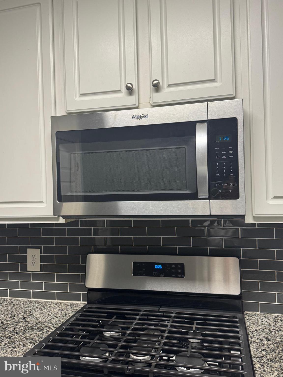 3850 Koval Lane Woodbridge, VA 22192 - Photo 11 of 61 a kitchen with wooden cabinets