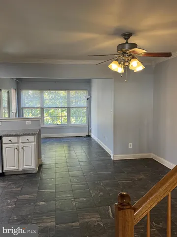 a view of a livingroom with wooden floor