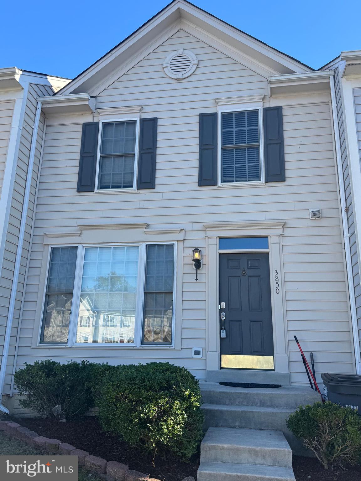 3850 Koval Lane Woodbridge, VA 22192 - Photo 2 of 61 a front view of a house with a garden