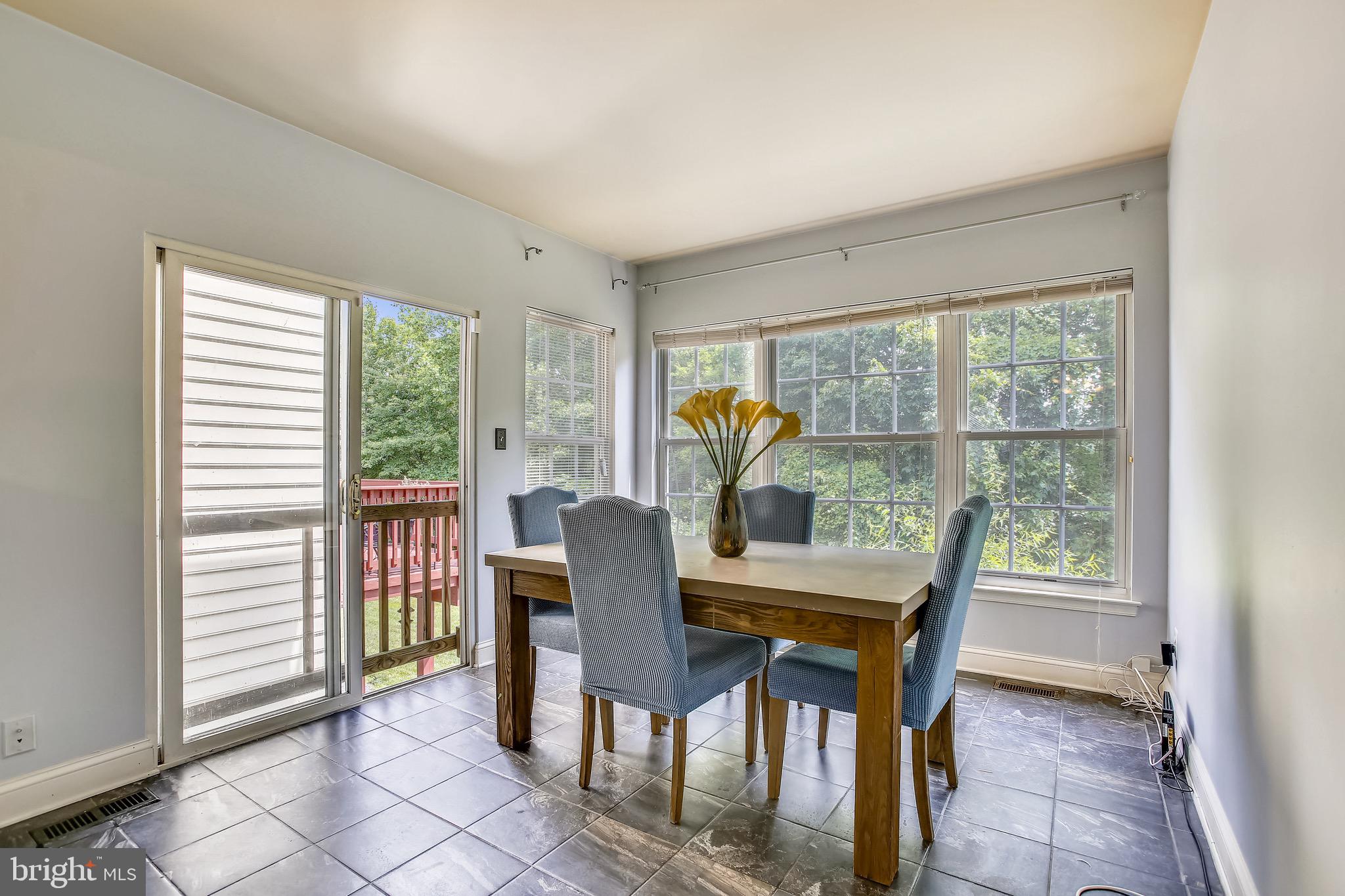 3850 Koval Lane Woodbridge, VA 22192 - Photo 22 of 61 a view of a dining room with furniture window and outside view