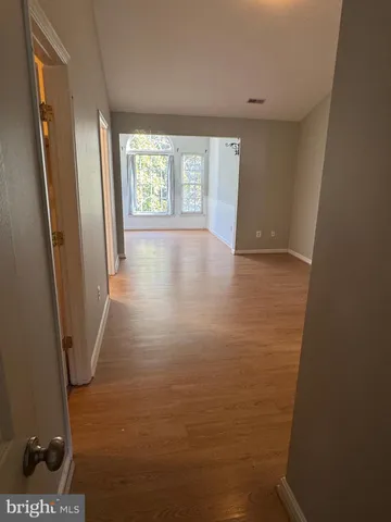 a view of storage and utility room with racks on the wall