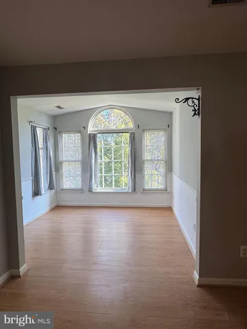 a bathroom with a tub and a shower