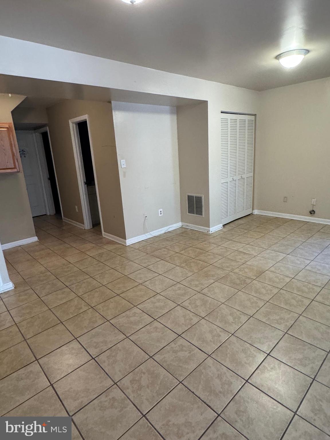 3850 Koval Lane Woodbridge, VA 22192 - Photo 37 of 61 a view of an empty room and wooden shelves