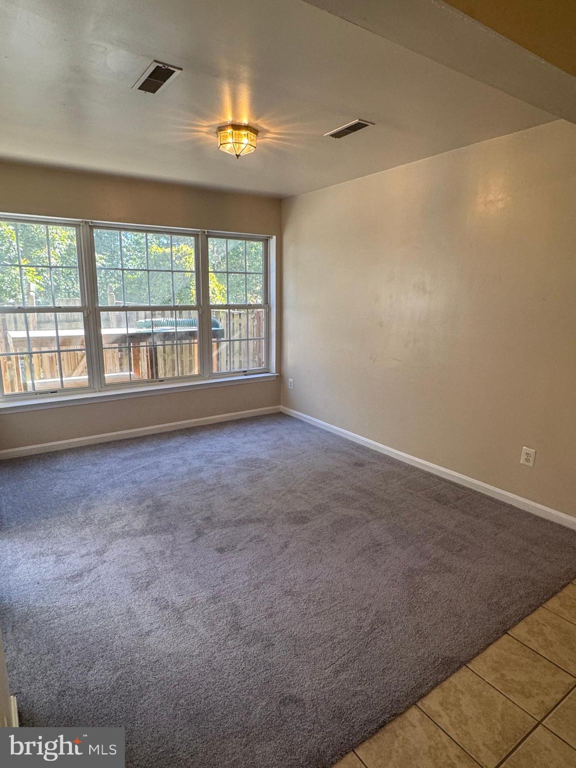 3850 Koval Lane Woodbridge, VA 22192 - Photo 41 of 61 an empty room with a empty space and windows