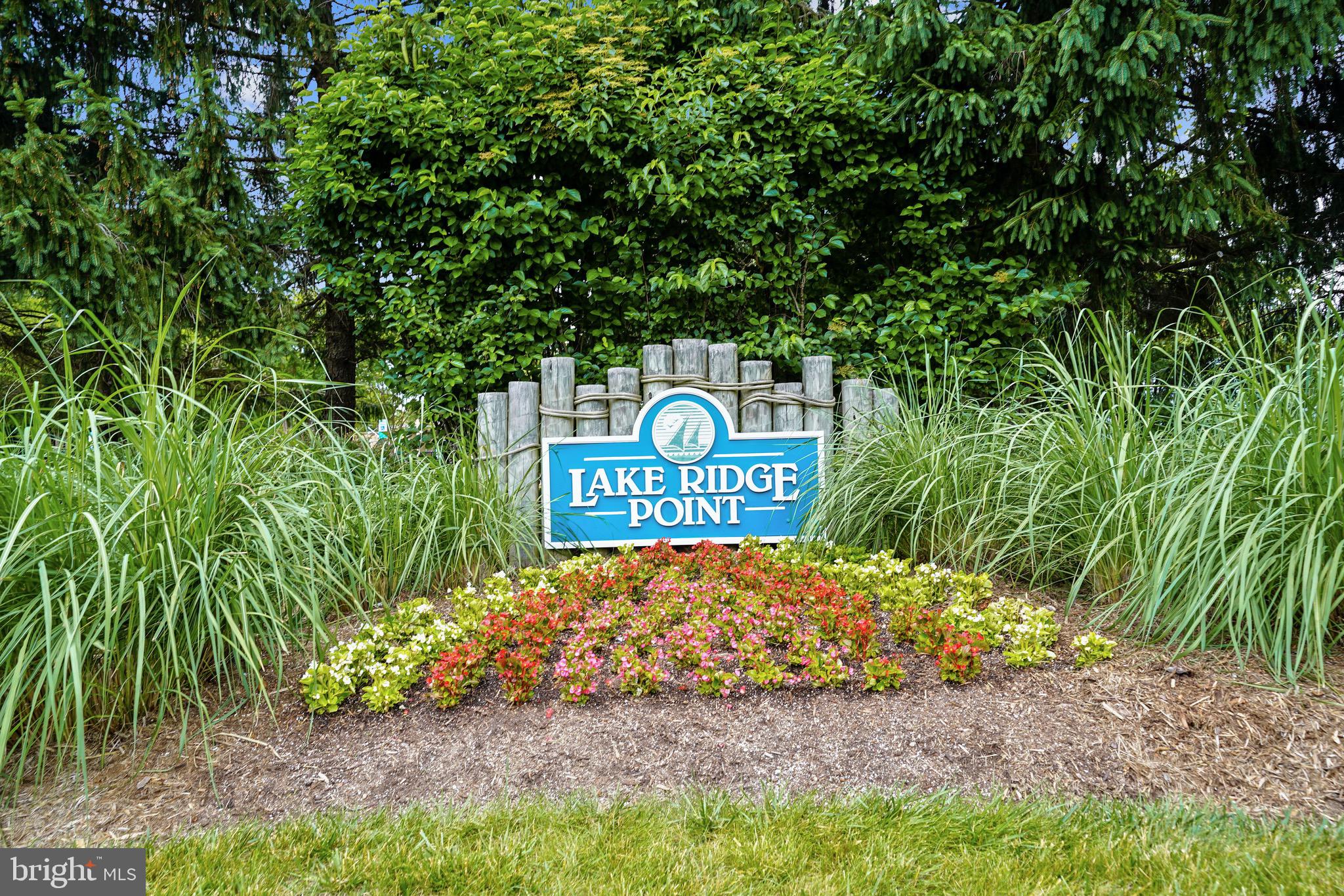 3850 Koval Lane Woodbridge, VA 22192 - Photo 55 of 61 a sign of golf club on a stone wall