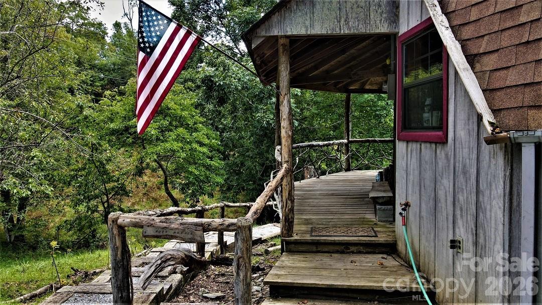 745 Broom Road Tuckasegee, NC 28783 - Photo 8 of 42 a view of deck with furniture
