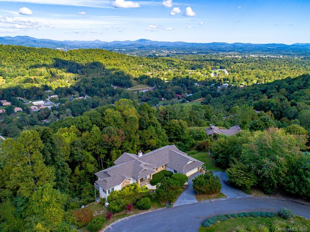 270 Country Ridge Road Laurel Park, NC 28739 - Photo 3 of 39 a view of a city with mountains in the background