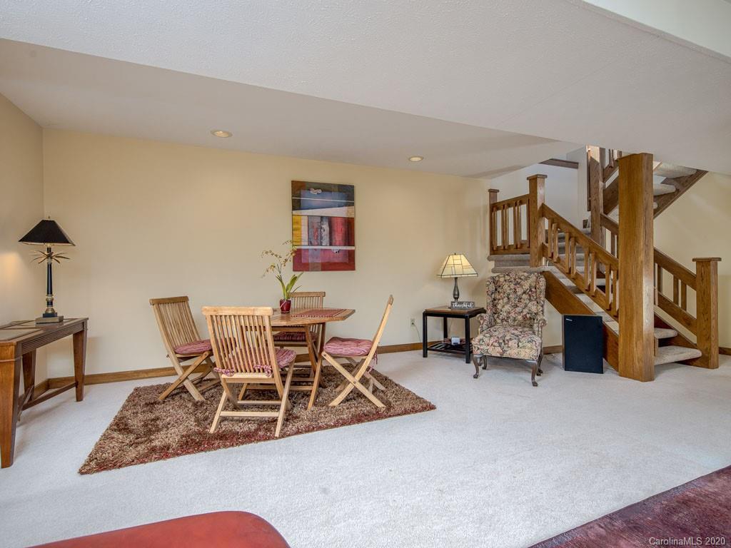 270 Country Ridge Road Laurel Park, NC 28739 - Photo 27 of 39 a view of a livingroom with furniture and a couch