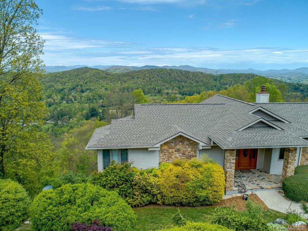 270 Country Ridge Road Laurel Park, NC 28739 - Photo 36 of 39 an aerial view of a house with yard and ocean view