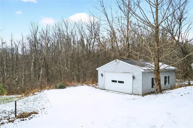 a view of a snow on the side of the road