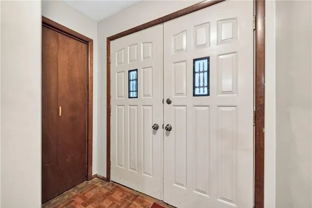 a view of a bathroom from the hallway