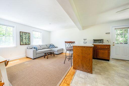 12 Pinehurst Drive Monument Beach, MA 02532 - Photo 14 of 31 a living room with a couch and a table
