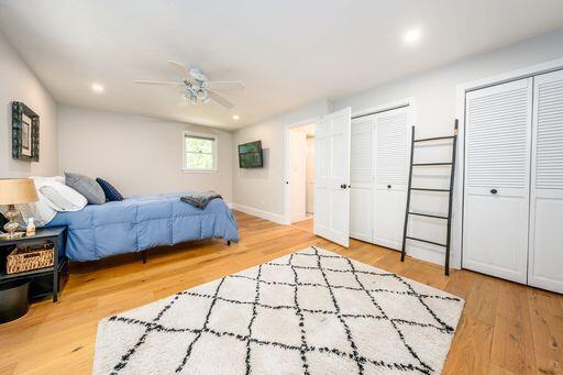 12 Pinehurst Drive Monument Beach, MA 02532 - Photo 23 of 31 a spacious bedroom with a bed and a dresser