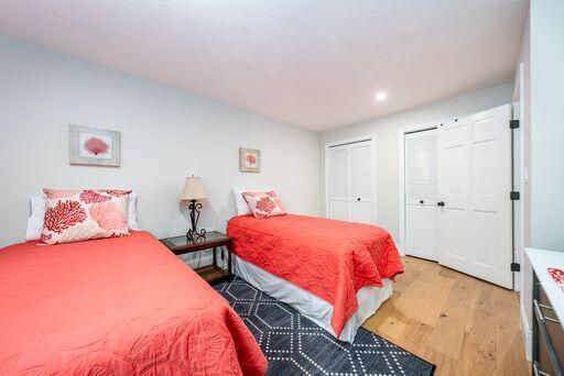 12 Pinehurst Drive Monument Beach, MA 02532 - Photo 24 of 31 a bedroom with two beds and a closet