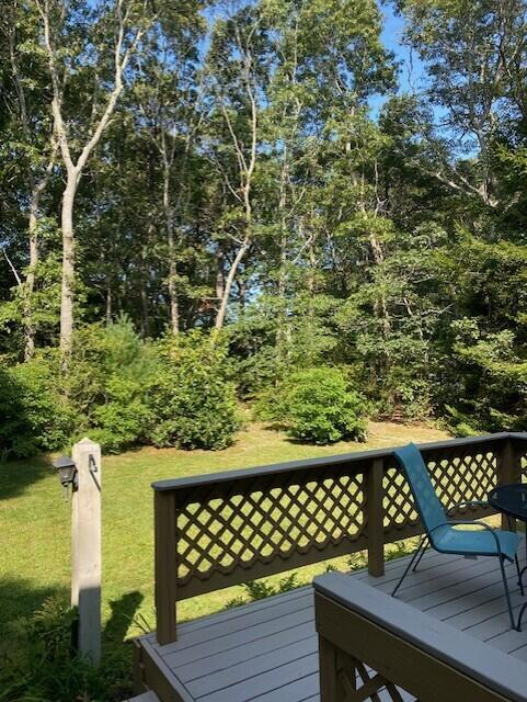 12 Pinehurst Drive Monument Beach, MA 02532 - Photo 29 of 31 a view of a chairs and table on the wooden floor