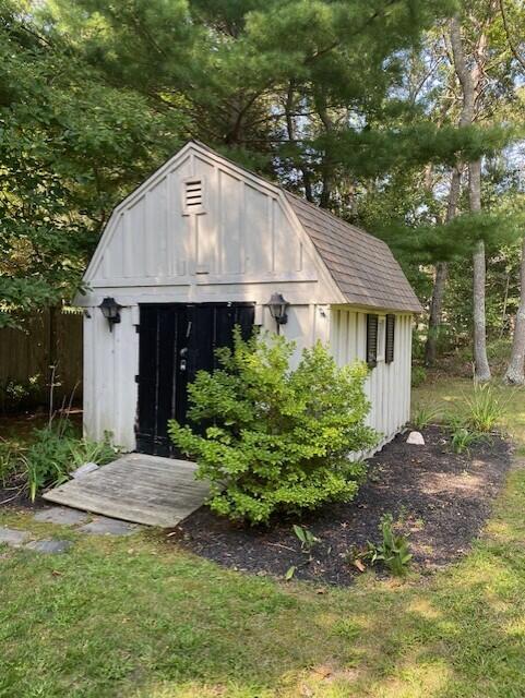12 Pinehurst Drive Monument Beach, MA 02532 - Photo 30 of 31 a front view of a house with a yard