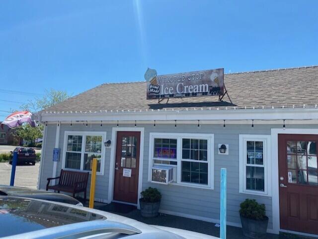 12 Pinehurst Drive Monument Beach, MA 02532 - Photo 31 of 31 a view of a brick building with many windows