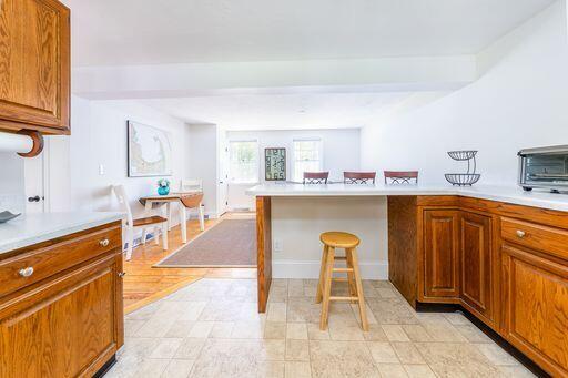 12 Pinehurst Drive Monument Beach, MA 02532 - Photo 9 of 31 a living room with stainless steel appliances granite countertop furniture a counter top space and a window