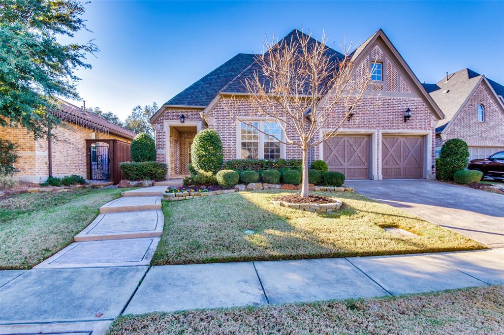 686 Flagstone Drive Irving, TX 75039 - Photo 1 of 1 a front view of house with yard and green space