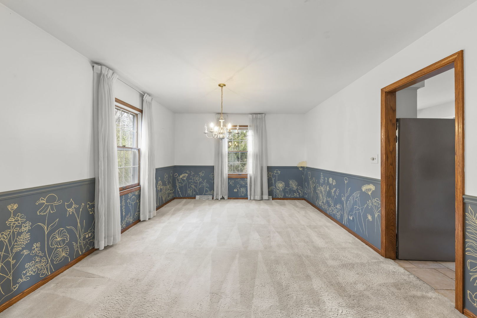 1150 Nottingham Lane Elgin, IL 60120 - Photo 29 of 33 an empty room with fireplace and windows