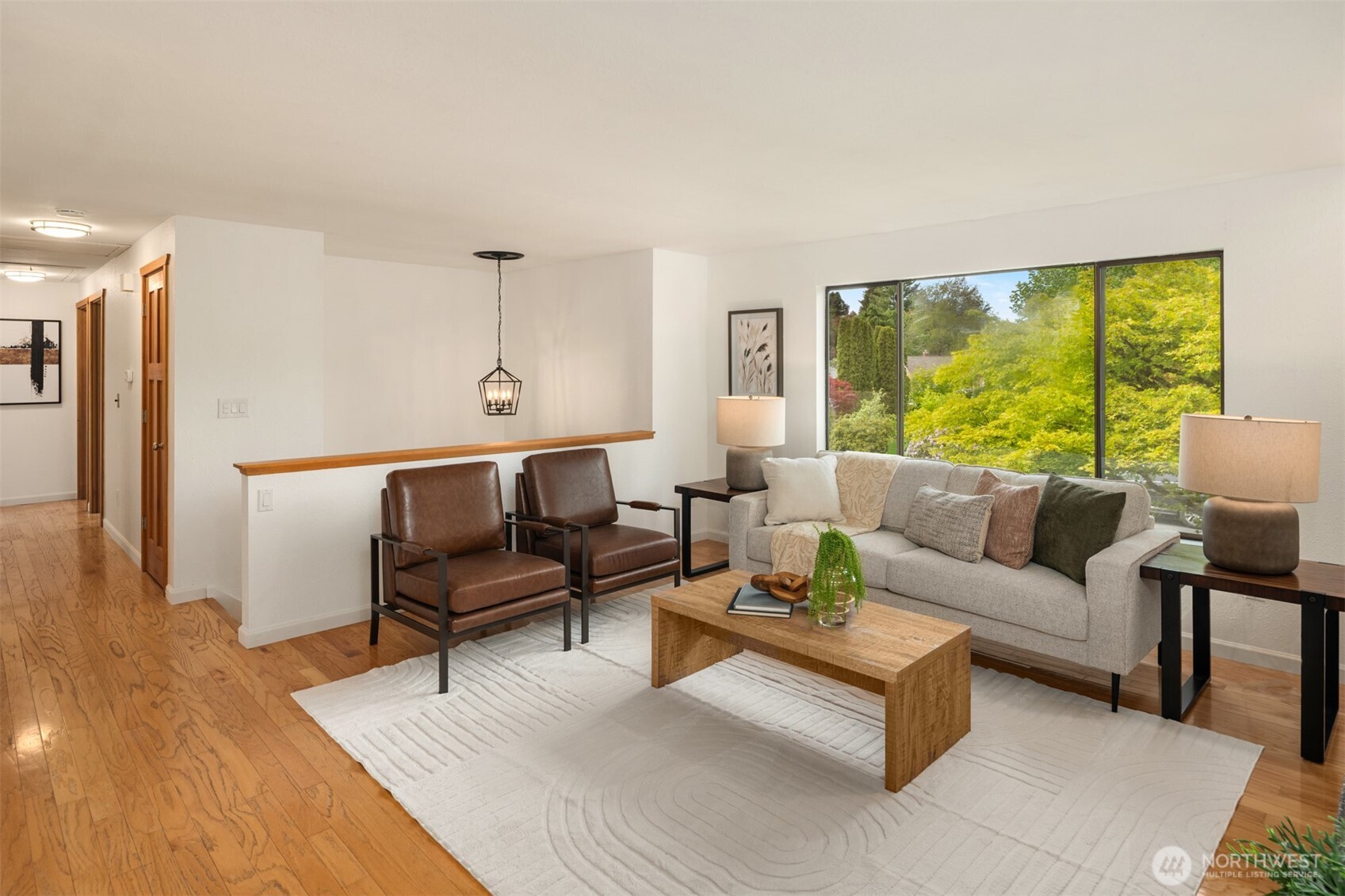 418 212th Street Southwest Bothell, WA 98021 - Photo 17 of 40 a living room with furniture and a large window