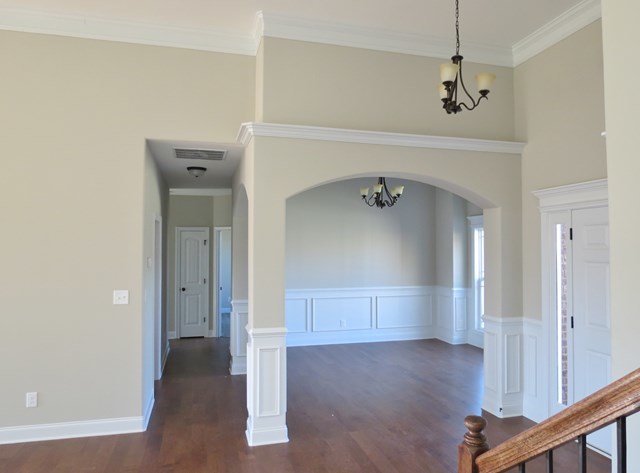 904 Rainbow Springs Road Macon, GA 31216 - Photo 2 of 16 a view of a hallway view with wooden floor and staircase